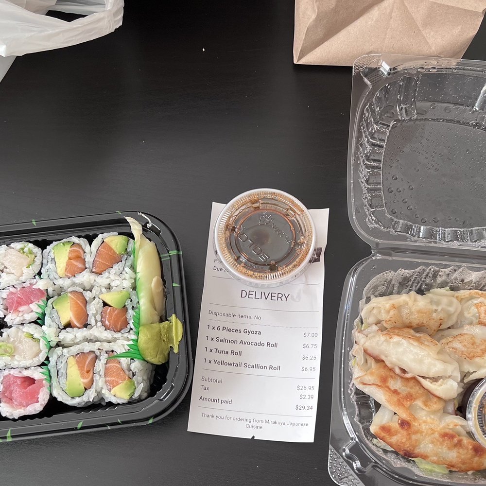 Salmon Avocado Roll, Tuna Roll, Yellowtail Scallion Roll, 6 Pieces Gyoza