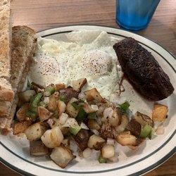Olde School Deli - Fried eggs, home fries with peppers and onions, steak cooked to my liking, rye toast.