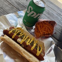 The Big Hot Dog - Hot dog with chips and a drink