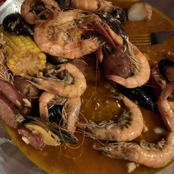 Surfing Crab - Shrimp with heads and black mussels corn, sausage and potatoes - Cajun/Creole Near Me - San Antonio, Texas Surfing Crab - Shrimp with heads and black mussels corn, sausage and potatoes - Cajun/Creole Near Me - San Antonio, Texas