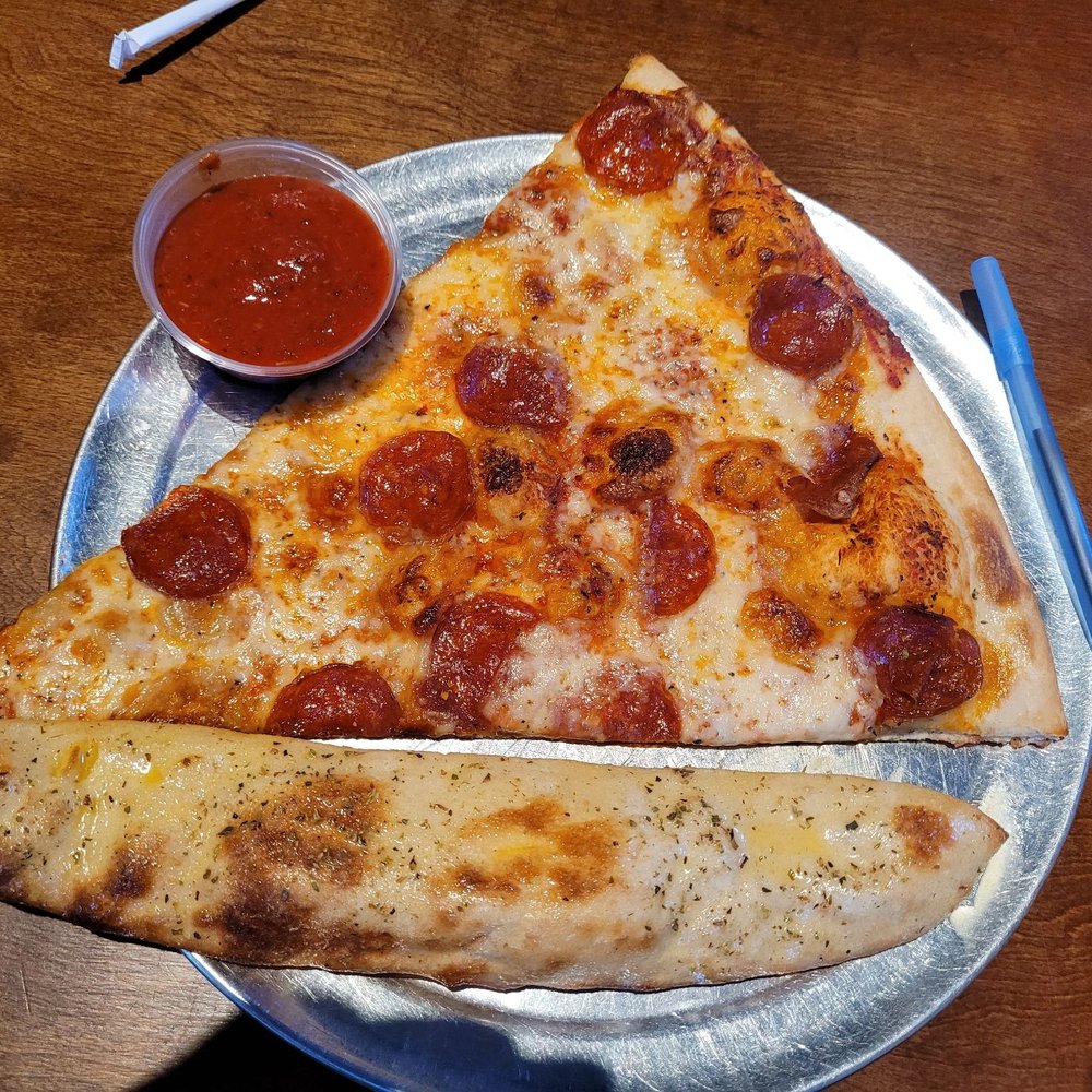 The Post - Pepperoni pizza and a bread stick - Pizza Near Me - Louisville, Kentucky The Post - Pepperoni pizza and a bread stick - Pizza Near Me - Louisville, Kentucky