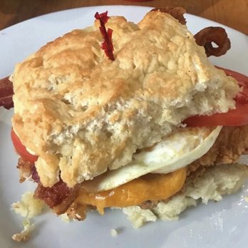 Mama's Boy at the Falls - The Farm biscuit at Mama's Boy is a huge biscuit with fried chicken, tomatoes, an over-medium egg, cheddar cheese and bacon. - Breakfast & Brunch Near Me - Athens, Georgia Mama's Boy at the Falls - The Farm biscuit at Mama's Boy is a huge biscuit with fried chicken, tomatoes, an over-medium egg, cheddar cheese and bacon. - Breakfast & Brunch Near Me - Athens, Georgia
