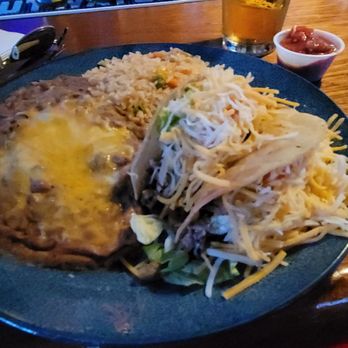 Lona's City Limits Cantina - One ground beef taco and one shredded beef taco. It's a throwback to old style Mexican food. - Karaoke Near Me - Long Beach, California