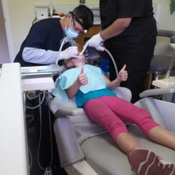Khai Nguyen, DDS - 7 year old girl getting 4 cavities fixed, no shot/gas or novicaine needed. Dr. Nguyen is fantastic!!!