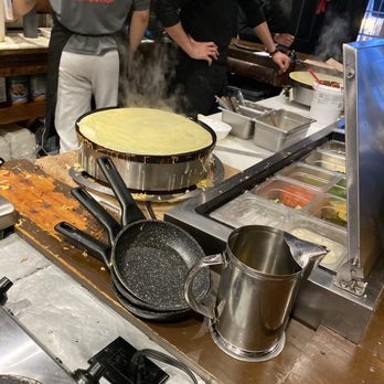Crêperie St-Paul - a group of people preparing food - Creperies Near Me - Montreal, Quebec Crêperie St-Paul - a group of people preparing food - Creperies Near Me - Montreal, Quebec