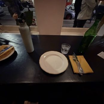 Popoca - Bar seating in front of window - Salvadoran Near Me - Oakland, California
