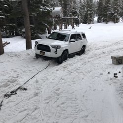 Mr K Automotive - Where we got stuck. He prepared chains for when the snow cat arrived.