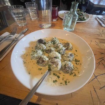 River and Woods - Gnocchi verde with trout in the background - New American Near Me - Boulder, Colorado River and Woods - Gnocchi verde with trout in the background - New American Near Me - Boulder, Colorado