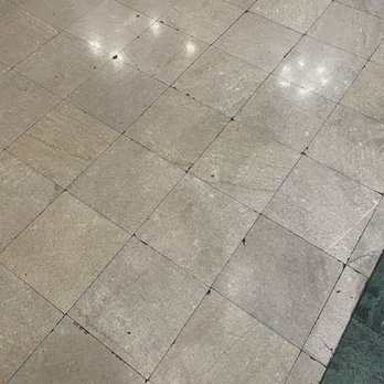 Hilton Garden Inn Jackson Downtown - Cracked, stained lobby floor - Hotels Near Me - Jackson, Mississippi
