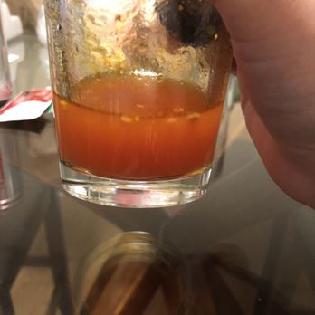 John Holly's Asian Bistro - The liquid I poured out of my to go container - Asian Fusion Near Me - Denver, Colorado