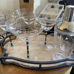 Perennial Home - Vintage cocktail coups and shaker on wood and iron tray.