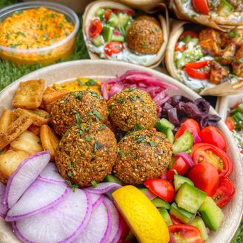 XENiA Mediterranean Kitchen - a plate of falafeli, salad, and pitas - Mediterranean Near Me - San Mateo, California XENiA Mediterranean Kitchen - a plate of falafeli, salad, and pitas - Mediterranean Near Me - San Mateo, California