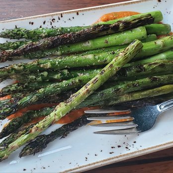 River Roast - Side order of asparagus ($10) comes with a pequillo romesco, similar to roasted red pepper sauce - American Near Me - Chicago, Illinois River Roast - Side order of asparagus ($10) comes with a pequillo romesco, similar to roasted red pepper sauce - American Near Me - Chicago, Illinois