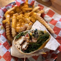 Shotgun Eddys - Cheesy fries and chicken wrap