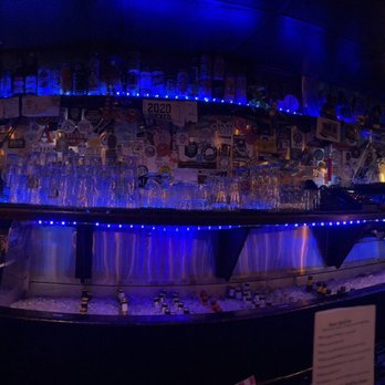 Bukowski Tavern - a bar with blue lights - American Near Me - Boston, Massachusetts