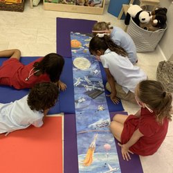 The Curious Child Learning Community - Exploring a book about our atmosphere and beyond!