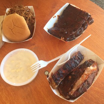 Porky's Rib Fest - Top - Jamaican pork and 1:3 slab from Rasta.  Bottom - Mac n cheese and sampler from Chicago. - Festivals Near Me - Bridgeview, Illinois