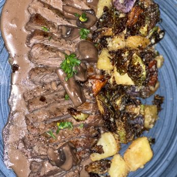 Black Walnut - Cast Iron strip with Peruvian potatoes and Brussels sprouts - New American Near Me - Oklahoma City, Oklahoma Black Walnut - Cast Iron strip with Peruvian potatoes and Brussels sprouts - New American Near Me - Oklahoma City, Oklahoma