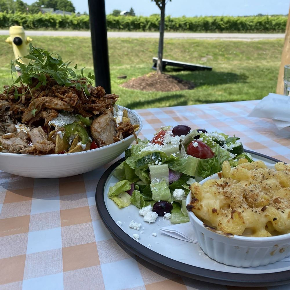 Bench Brewing - Bench BBQ Pork Nachos ($25) & Mac n Cheese ($14) with side Greek salad ($6). - Brewpubs Near Me - Lincoln, Ontario Bench Brewing - Bench BBQ Pork Nachos ($25) & Mac n Cheese ($14) with side Greek salad ($6). - Brewpubs Near Me - Lincoln, Ontario