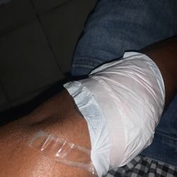 The Empire of Ink Tattoo & Piercing - Improper bandaging. You can see where the bandaid isn't completely on my tattoo