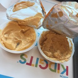 Auntie Anne's - My normal, cheddar cheese sauce on the left, my friends disgusting (same) sauce on the right.