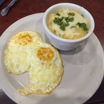 Café Eclectic - Two eggs over medium with cheese and jalapeño grits! $6 total. - Breakfast & Brunch Near Me - Memphis, Tennessee Café Eclectic - Two eggs over medium with cheese and jalapeño grits! $6 total. - Breakfast & Brunch Near Me - Memphis, Tennessee