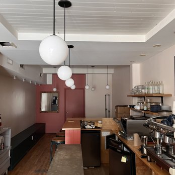 Papa Construction - the interior of a coffee shop - General Contractors Near Me - Montreal, Quebec Papa Construction - the interior of a coffee shop - General Contractors Near Me - Montreal, Quebec