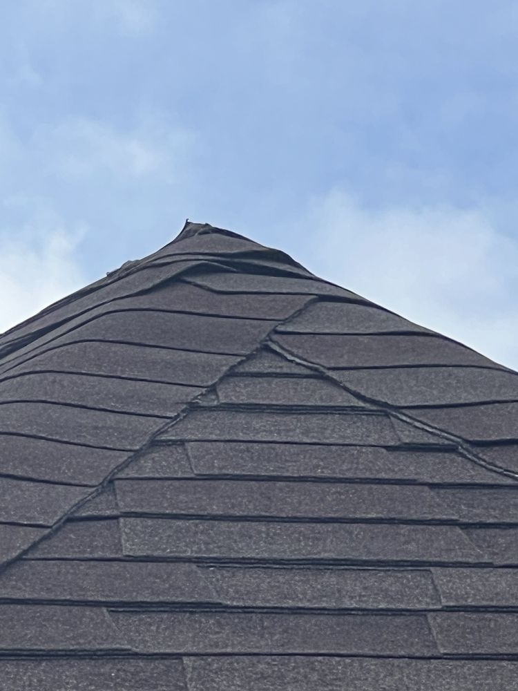 Slide of Tucker Roofing Systems