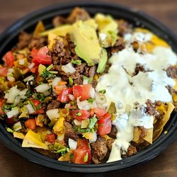 Carnitas Don Cuco - Nacho supreme fresh meat chips, And House served with a healthy serving of refried beans, nacho cheese, your choice of protein, sour cream,