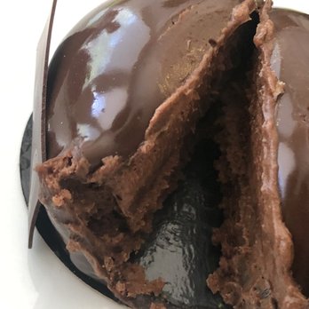 Fleur de Cocoa - Cross section of seduction - a thicker layer of ganache is floating in the mousse on top of the cake - Bakeries Near Me - Los Gatos, California Fleur de Cocoa - Cross section of seduction - a thicker layer of ganache is floating in the mousse on top of the cake - Bakeries Near Me - Los Gatos, California
