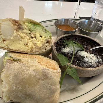 Madi - Surfers burrito with the side of black beans. Good portion! - Breakfast & Brunch Near Me - San Diego, California Madi - Surfers burrito with the side of black beans. Good portion! - Breakfast & Brunch Near Me - San Diego, California