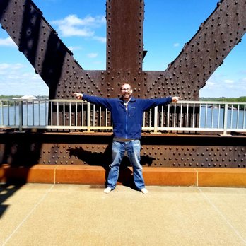 Big Four Bridge - Middle of the bridge (to his right, Indiana...to his left, Kentucky!) - Landmarks & Historical Buildings Near Me - Louisville, Kentucky Big Four Bridge - Middle of the bridge (to his right, Indiana...to his left, Kentucky!) - Landmarks & Historical Buildings Near Me - Louisville, Kentucky