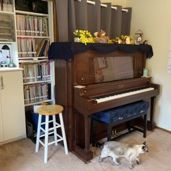 J Baugh Piano Studio - This is what my studio looks like inside. The cat's name is Kaylee. She likes to visit and listen to music.
