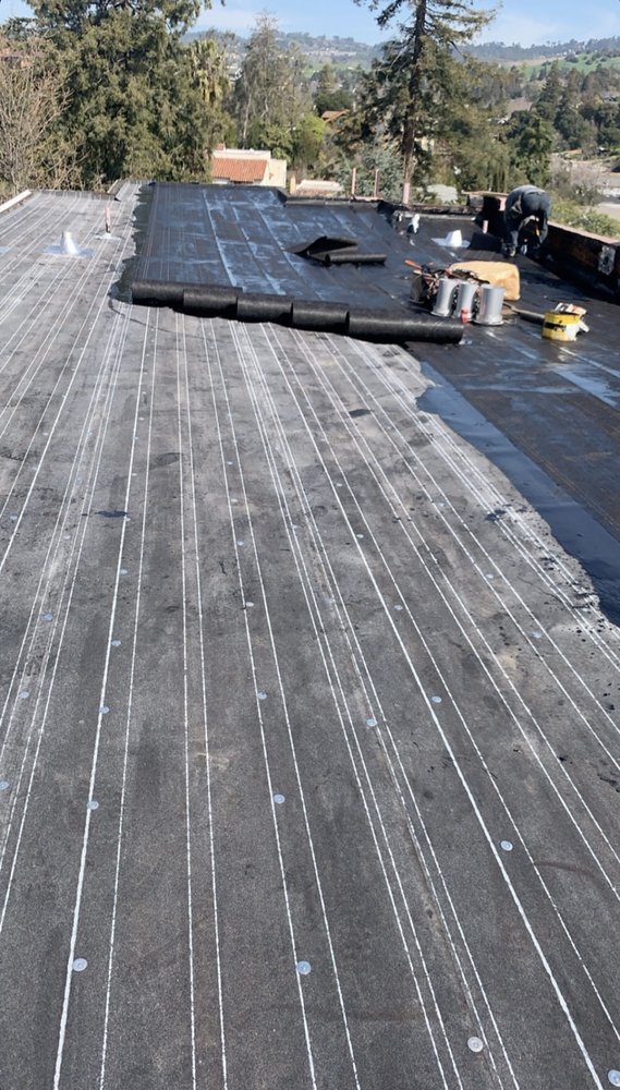 Slide of LAAC Roofing Services