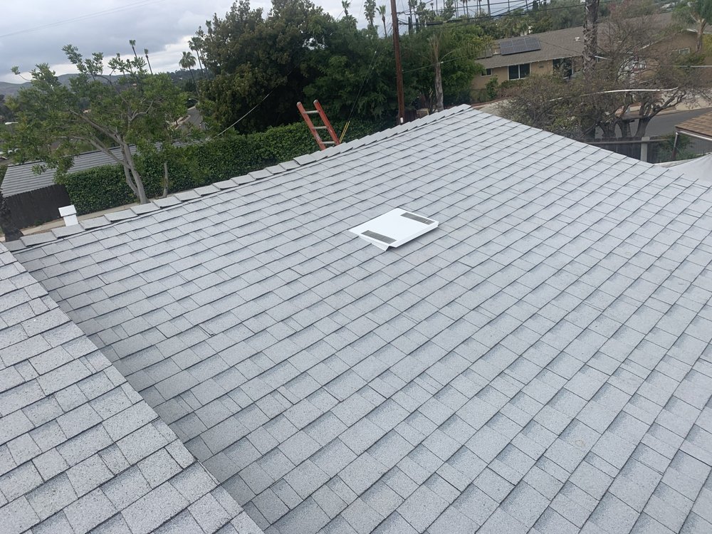Slide of SZ Roofing