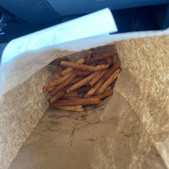 Five Guys - the inside of a bag of french fries - Burgers Near Me - Flint Township, Michigan