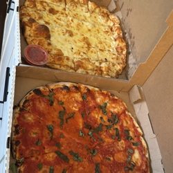From top to bottom; Capri pizza (Small), Cheese Focaccia, Margherita (Large)