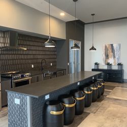 500 West Trade - Outdoor rooftop kitchen with a gas stove