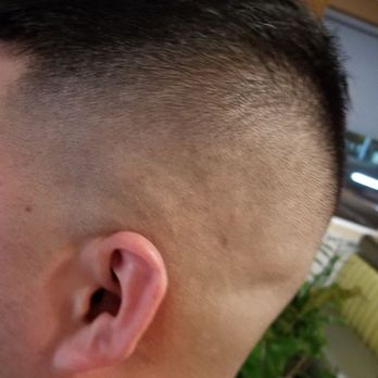 Unlimited Barber - Design by Peter... he did a really good job cleaning up and the skin fade double Blade was perfect - Barbers Near Me - Orange, California