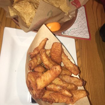 Chili's - Chips and salsa appetizer and Bloomin petals onion rings - Tex-Mex Near Me - Riverside, California Chili's - Chips and salsa appetizer and Bloomin petals onion rings - Tex-Mex Near Me - Riverside, California