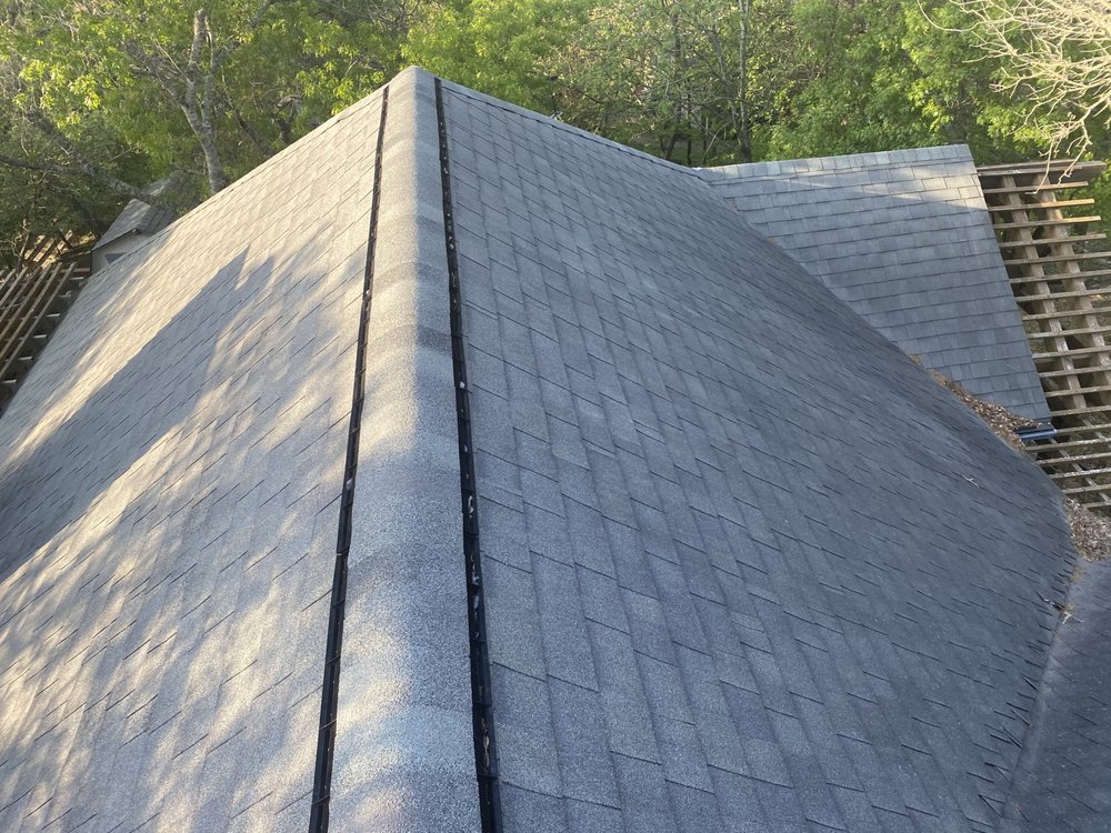 Slide of Strain Roofing