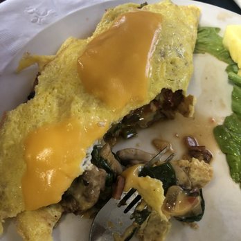 Sweet Temptations - Everything omelette half eaten - Breakfast & Brunch Near Me - McAllen, Texas Sweet Temptations - Everything omelette half eaten - Breakfast & Brunch Near Me - McAllen, Texas