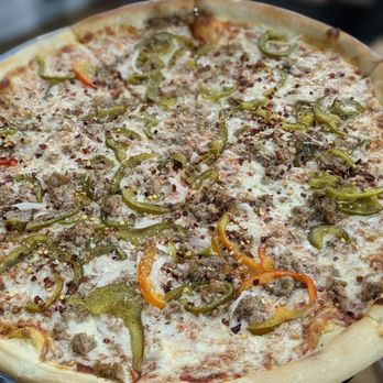 Pizza a Modo Mio - a pizza on a rack - Pizza Near Me - Charleston, South Carolina Pizza a Modo Mio - a pizza on a rack - Pizza Near Me - Charleston, South Carolina