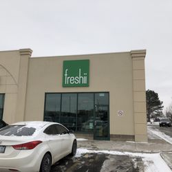 Freshii - Exterior of Freshii located in a plaza with Harveys
