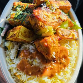 Tikka Shack Indian Grub - Paneer and chicken tikka over rice and salad - Indian Near Me - Austin, Texas