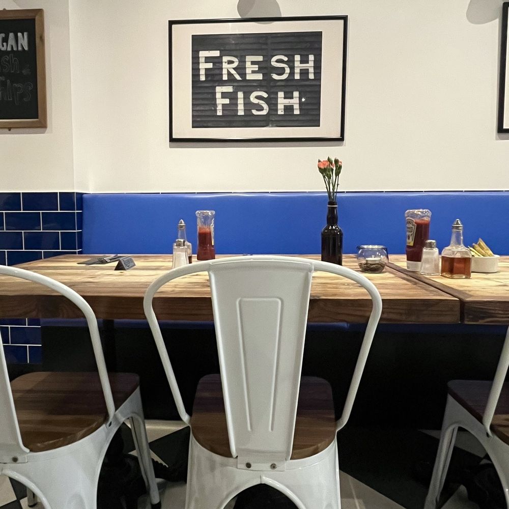 Hobson's Fish & Chips - The clean white/blue and natural wood table tops give it a very cool vibe - British Near Me - London, XGL