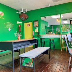 Lanna Thai Kitchen - Long table for chitchat with friend and family.