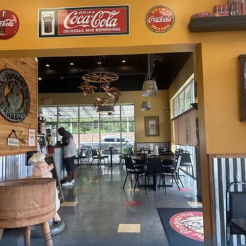 The Pompous Pig - Inside seating - Barbeque Near Me - Anderson, South Carolina The Pompous Pig - Inside seating - Barbeque Near Me - Anderson, South Carolina