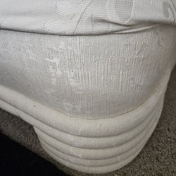 Another Time Around Furniture - This set has been slip covered from day one.  Original has never been used without slip cover.  Same for large pillows. This set is pristine