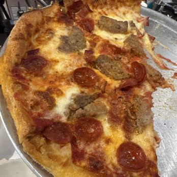 Farmhouse Kitchen - Boca Raton - Sausage, pepperoni, and bacon pizza - I couldn't get the full pie since my husband was hungry! - New American Near Me - Boca Raton, Florida